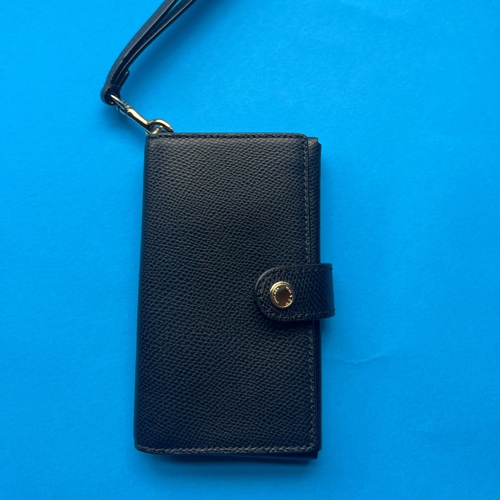 Coach Wallet Wristlet snap closure. Midnight